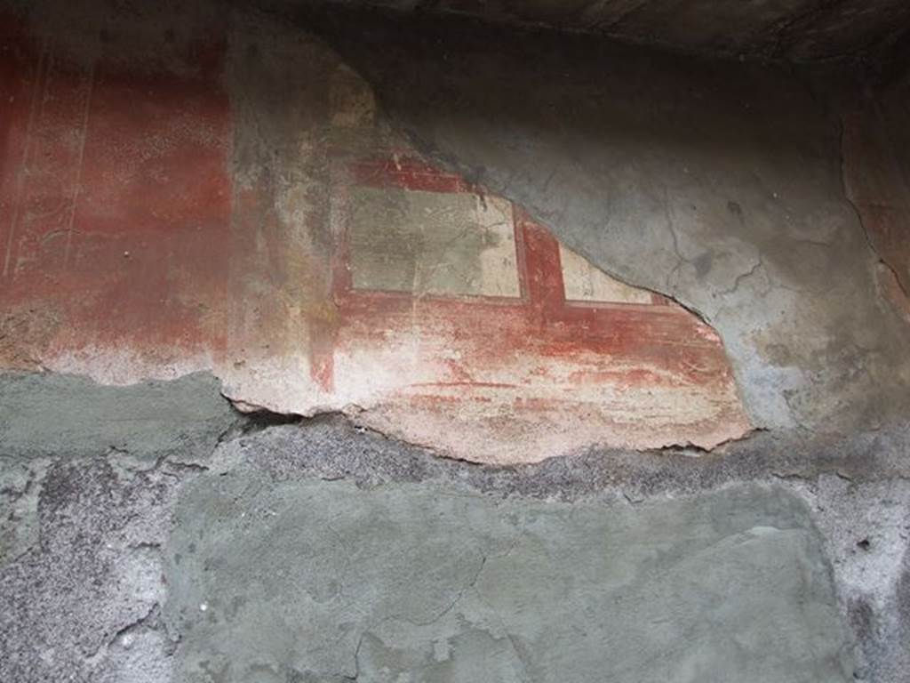 VI.7.19 Pompeii. December 2006. Detail of remains of painted south wall in tablinum.
