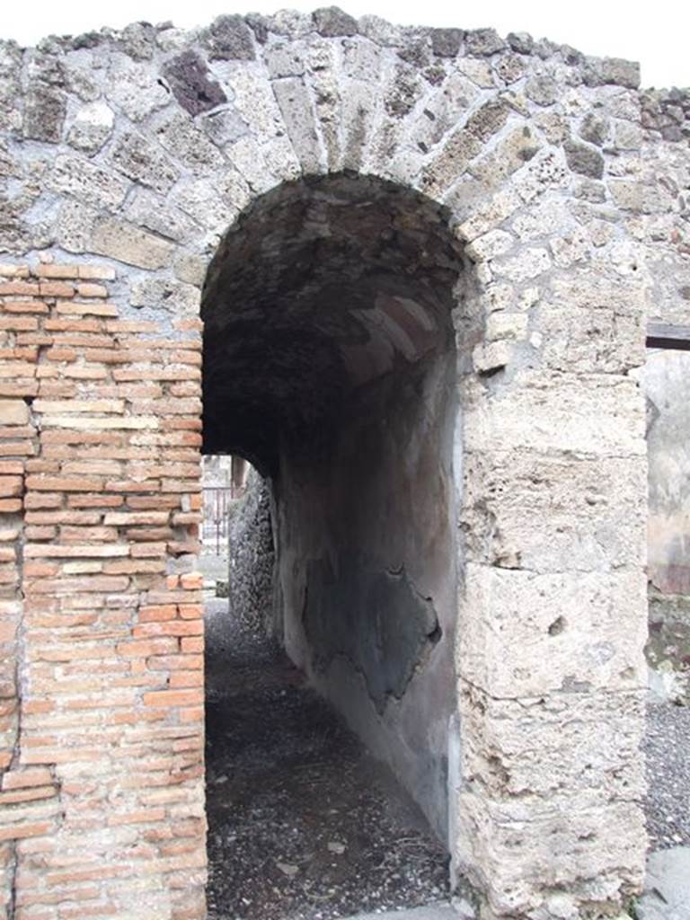 VI.7.20 Pompeii. December 2006.   Looking east from peristyle, along corridor from peristyle of VI.7.20 to atrium of VI.7.21. On the right would be the small exedra with medallions.

