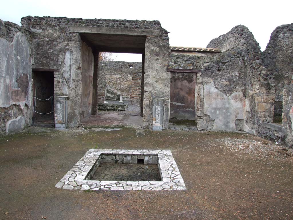 VI.7.23 Pompeii. December 2006. Atrium with impluvium.