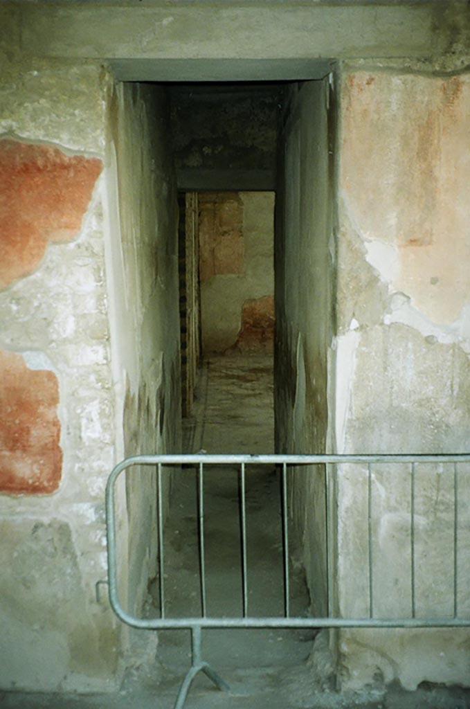 VI.8.3/5 Pompeii. July 2010. 
Room 5, corridor, looking south to atrium. Photo courtesy of Rick Bauer.
