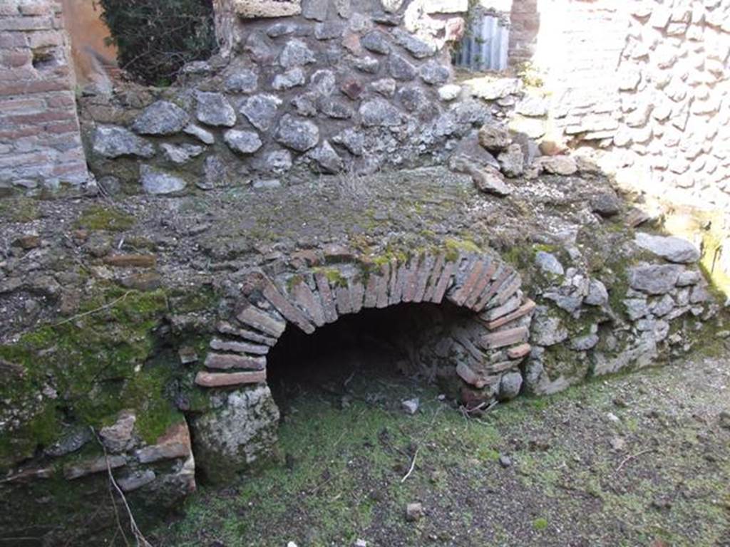 VI.8.22 Pompeii.  March 2009.  Room 10.  Kitchen.  Bench and hearth.