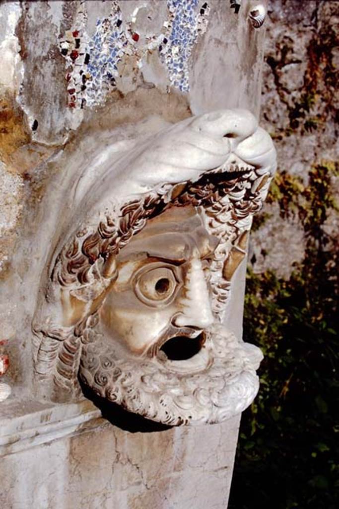 VI.8.22 Pompeii. 1968. Hollow marble mask of bearded male figure on north side of fountain. 
Photo by Stanley A. Jashemski.
Source: The Wilhelmina and Stanley A. Jashemski archive in the University of Maryland Library, Special Collections (See collection page) and made available under the Creative Commons Attribution-Non Commercial License v.4. See Licence and use details.
J68f1245
