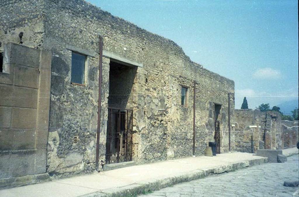 VI.8.23 and VI.8.24 Pompeii. July 2011. Two entrance doorways on west side of Via Mercurio. Photo courtesy of Rick Bauer.