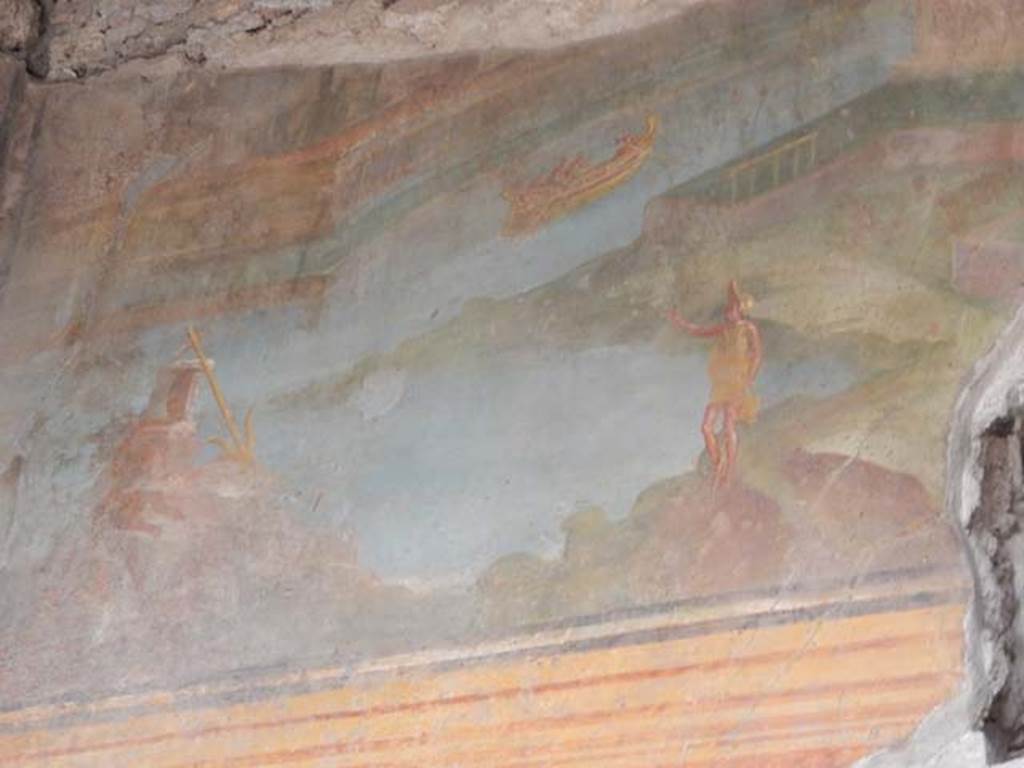 VI.8.23 Pompeii. May 2017. Detail from west side of river landscape on upper north wall of portico. 
A boat with several persons aboard is seen on a river flanked by porticoes.
In the lower left is an anchor leaning against a rock, on the right is a fisherman.
Photo courtesy of Buzz Ferebee.
