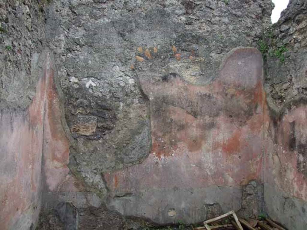 VI.9.2 Pompeii. May 2010. Room 14, south wall. The outline of the painted flying figure can just about be seen on the right side of the south wall. According to Overbeck-Mau, a painting of Venus fishing would have been seen in the centre of wall.
See Overbeck J., 1884. Pompeji in seinen Gebuden, Alterthmen und Kunstwerken. Leipzig: Engelmann. (p.310)
See Helbig, W., 1868. Wandgemlde der vom Vesuv verschtteten Stdte Campaniens. Leipzig: Breitkopf und Hrtel. (355)

