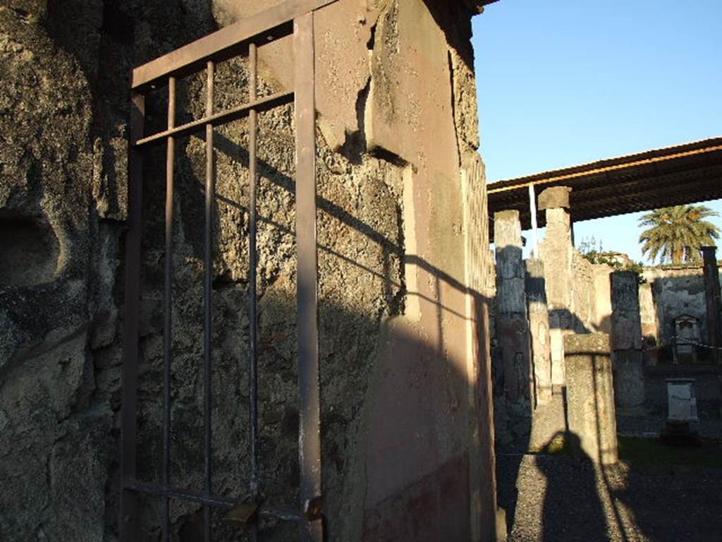 VI.9.6 Pompeii. December 2006. North wall of fauces, leading to atrium.