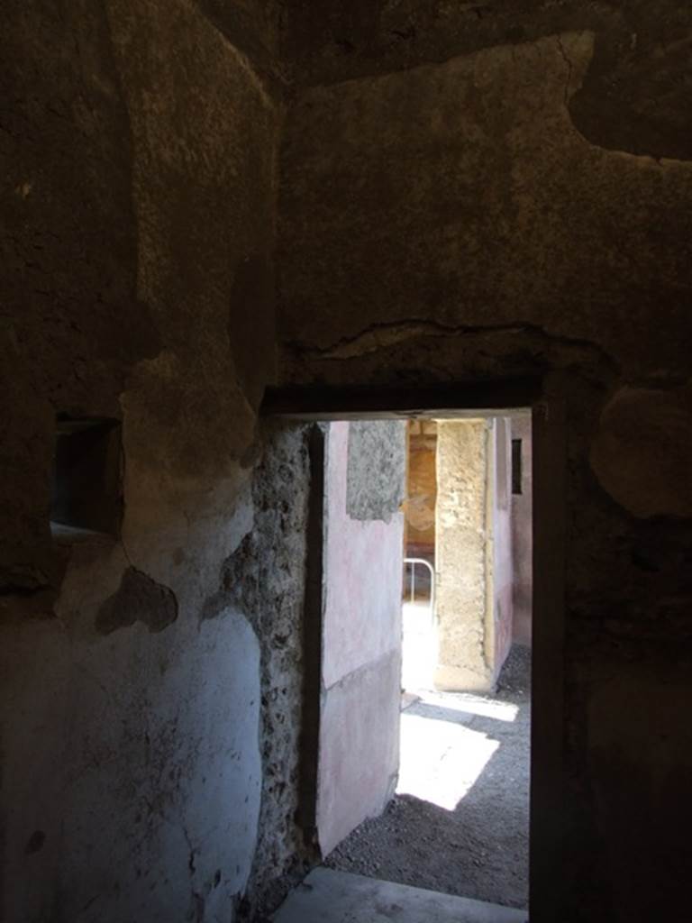 VI.9.6 Pompeii. March 2009. Room 7, west wall with doorway to room 4 and atrium.