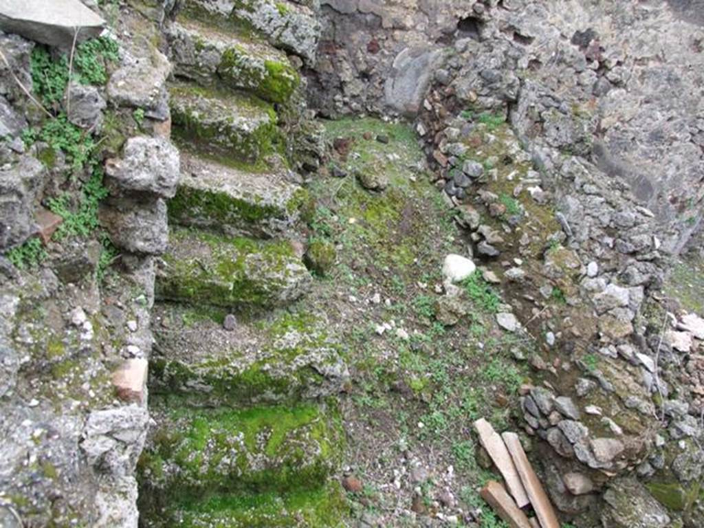 VI.10.7 Pompeii. March 2009. Stairs in south-west corner, in room 21, looking west.