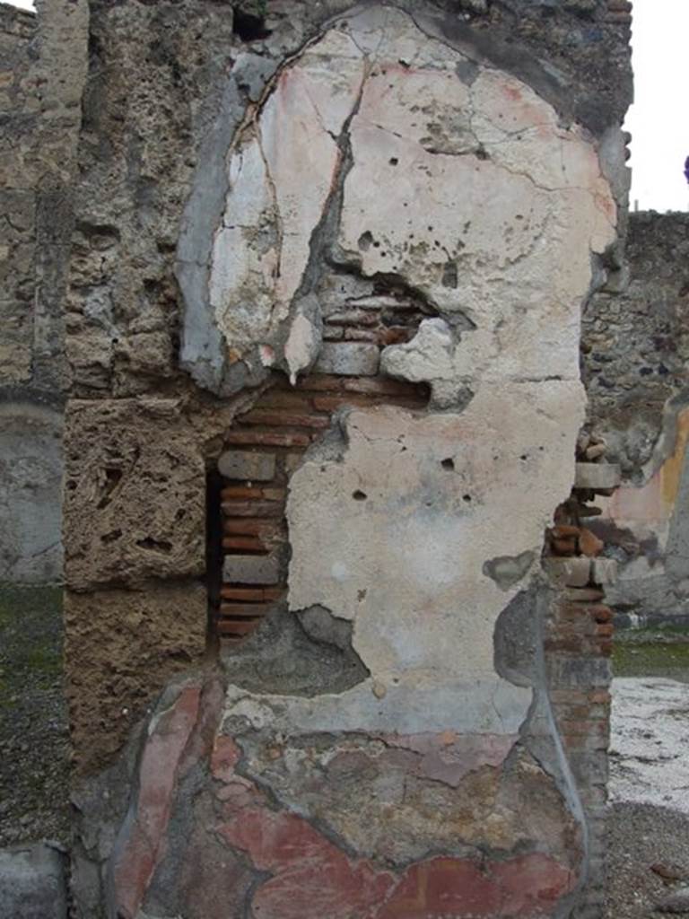 VI.10.11 Pompeii. March 2009. Room 3, atrium with plaster between room 9 and room 8.
A painting of Zeus was seen on this pilaster.
