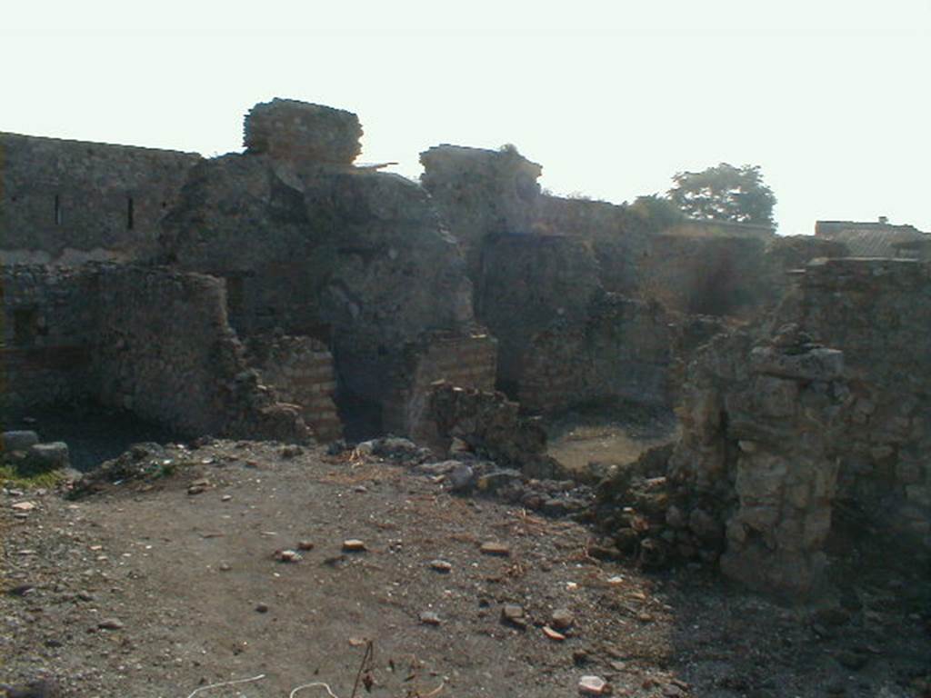 VI.10.14 Pompeii. March 2009. Looking south-east from stairs of VI.10.7 House of Black Anchor.