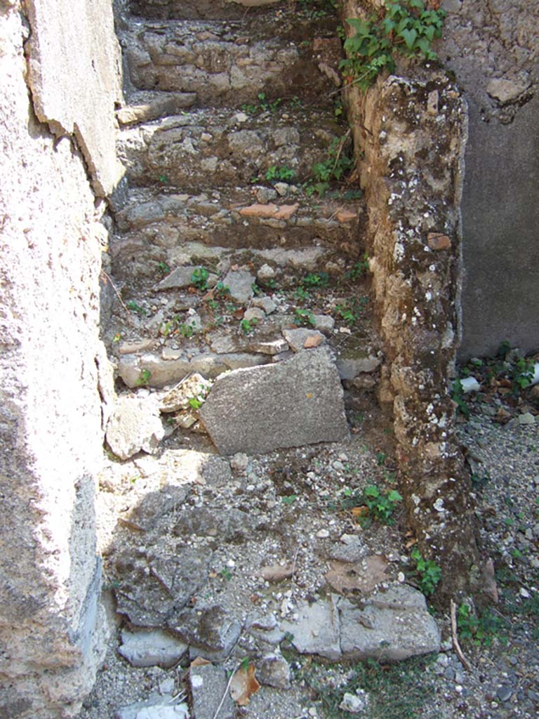 VI.11.6 Pompeii. September 2005. Stairs to the upper floor, on south side of long corridor.