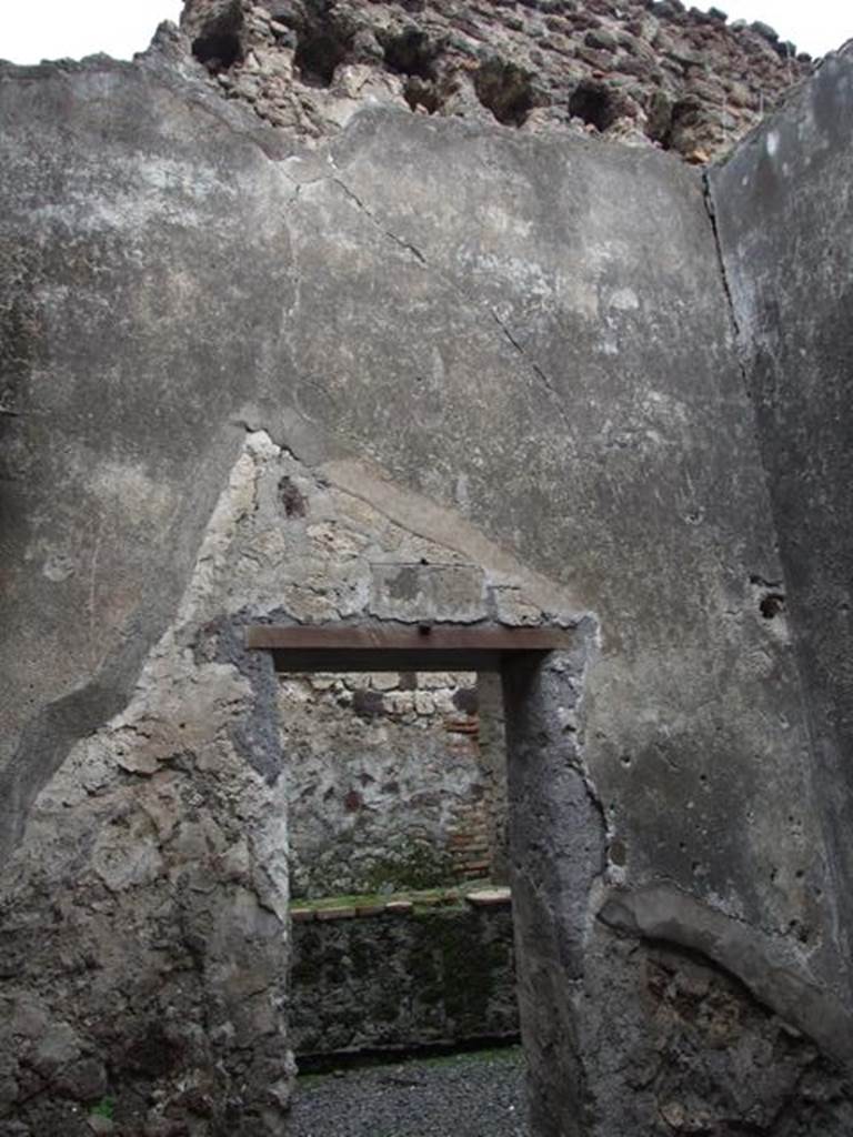 VI.11.9 Pompeii. March 2009. Room 12, with doorway in north wall to room 13, kitchen.