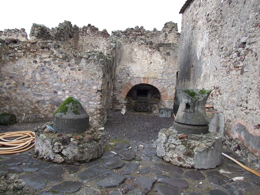 VI.11.9 Pompeii. December 2006. Room 16, mills in small bakery. 