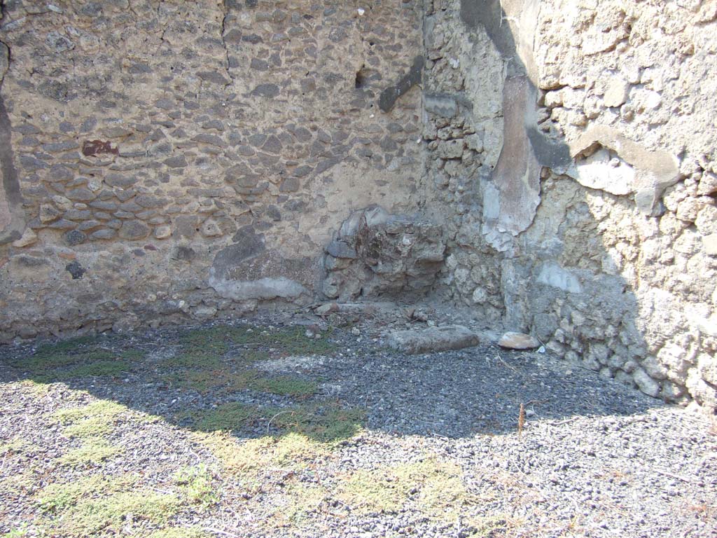 VI.11.13 Pompeii. September 2005. Hearth in north-west corner of atrium.