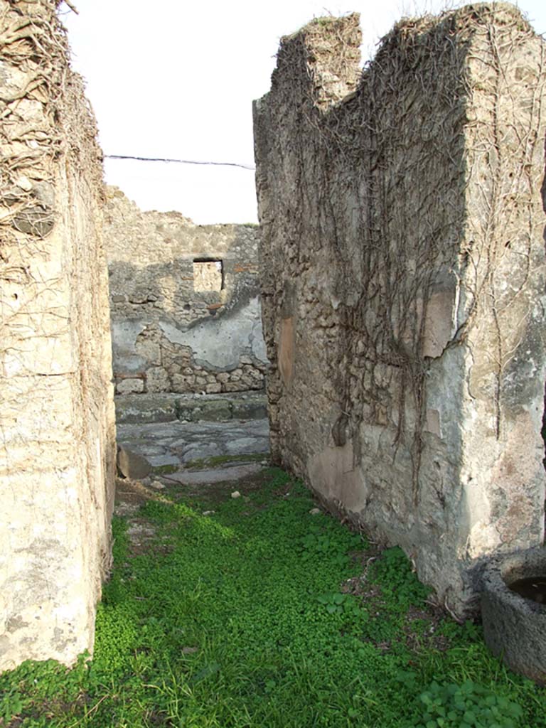 VI.11.19 Pompeii. December 2007. 
Looking east out through entrance doorway (1) into Vicolo del Labirinto, from atrium.
