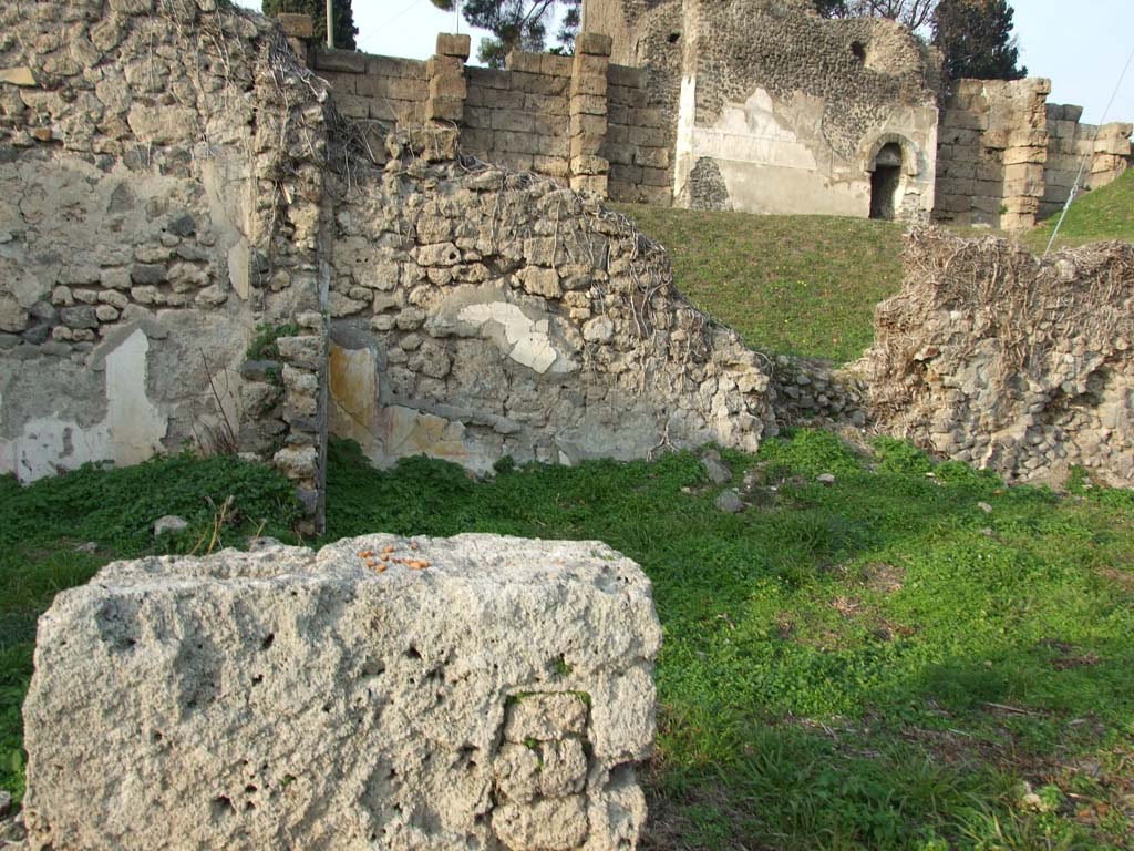 VI.11.19 Pompeii. December 2007. Rooms against north wall, with oecus (5) in centre, and site of stairs in room on right.  