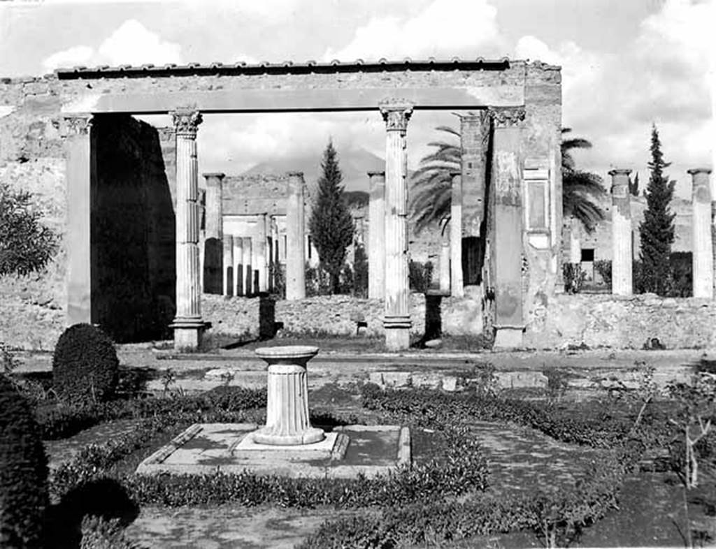 VI.12.2 Pompeii. 1945. Looking north across first garden from rear of tablinum window, towards exedra and rear peristyle. Photo courtesy of Rick Bauer.