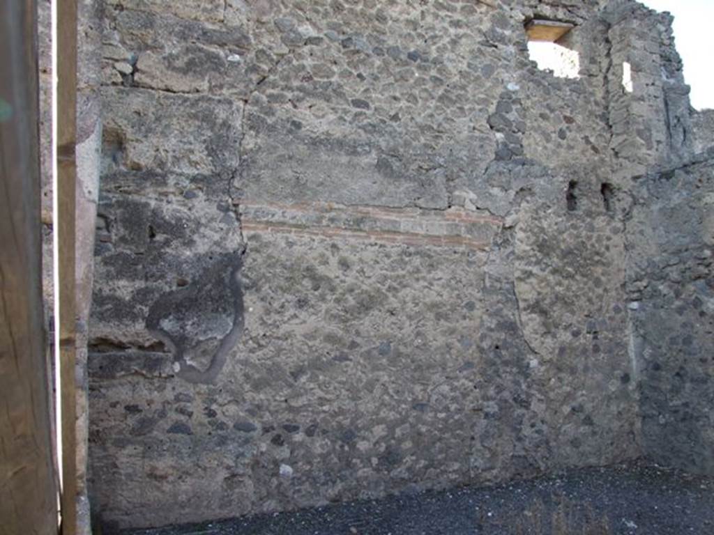 VI.13.1 Pompeii. December 2007. West wall of shop.  