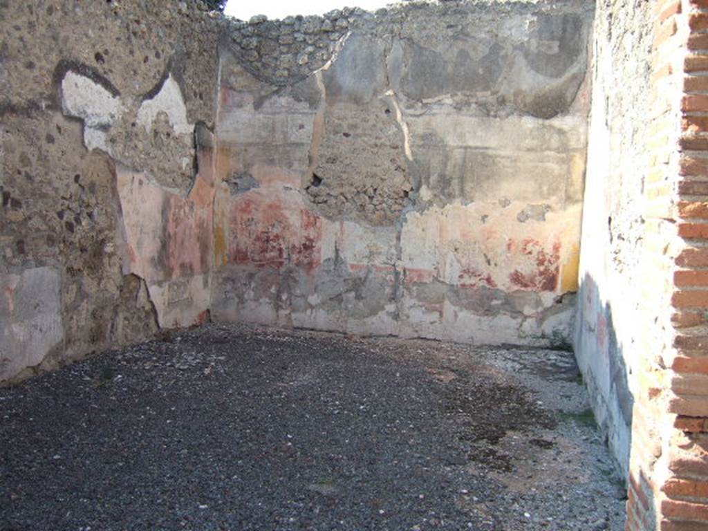 VI.13.2 Pompeii. September 2005. Summer triclinium, looking north. According to RdSPomp, found on the west wall (on the left) was the painting of Medea and the daughters of Pelias.
This was detached from the west wall and taken to the Naples Museum. 
See Rivista di Studi Pompeiani, XVI, 2005 (p.190) and note 56. 
The west wall would have had a red plinth, and a black zoccolo. In the central aedicula panel would have been a painting of Medea and the daughters of Pelias. The side panels would have been red, separated by narrow yellow compartments painted with silver candelabra design.
See Bragantini, de Vos, Badoni, 1983. Pitture e Pavimenti di Pompei, Parte 2. Rome: ICCD. (p.263, triclinio ‘20’).
