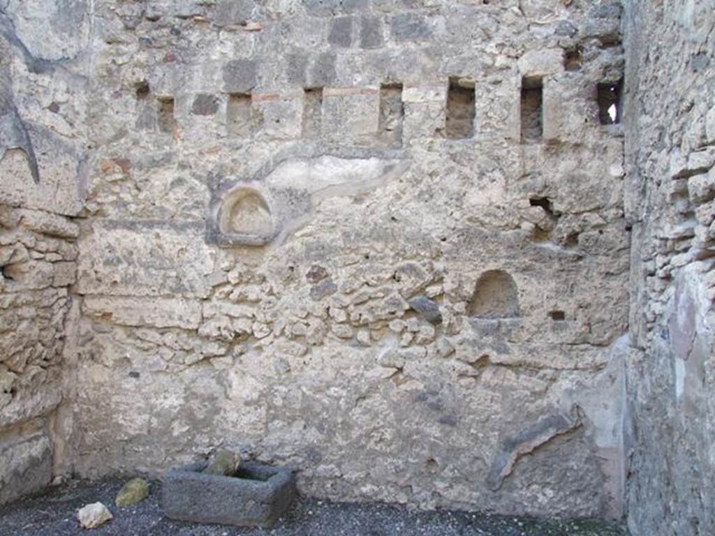 VI.13.7 West wall.