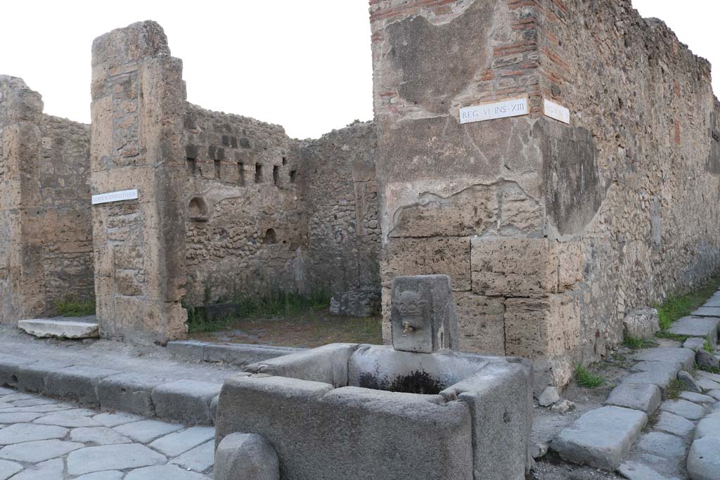 Fountain outside VI.13.7, Pompeii. December 2018. Looking north-west on Via della Fortuna. Photo courtesy of Aude Durand.