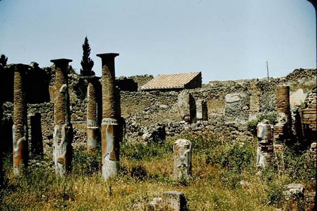 VI.13.6/8/9 Pompeii. 1957. Looking north-west across peristyle. Photo by Stanley A. Jashemski.
Source: The Wilhelmina and Stanley A. Jashemski archive in the University of Maryland Library, Special Collections (See collection page) and made available under the Creative Commons Attribution-Non Commercial License v.4. See Licence and use details. 
J57f0036
