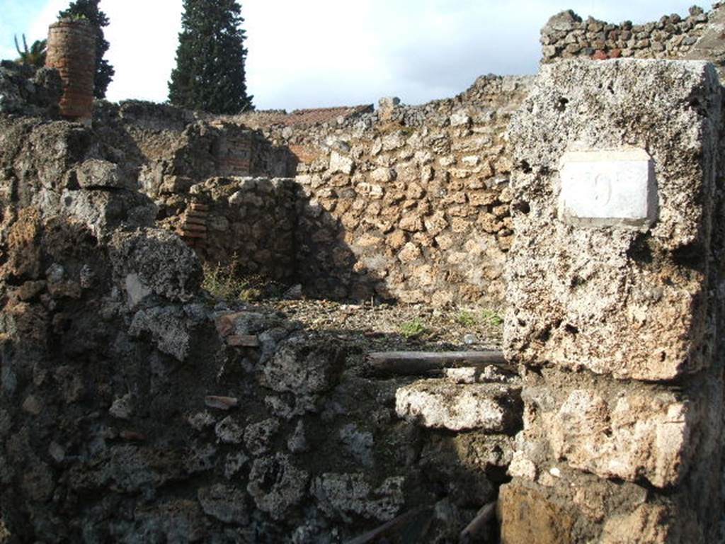 VI.13.9 Pompeii. December 2004.  Looking north-west from entrance doorway, towards room on north side of entrance doorway.
According to Varone, found inscribed near the entrance was 
Nunc est ira recens nunc est disc[edere tempus]
si dolor afuerit crede redibit [amor]    [CIL IV 4491]
This translated as 
Anger is now fresh, it is better now to retreat. When resentment has gone, believe me, love will return
See Varone, A., 2002. Erotica Pompeiana: Love Inscriptions on the Walls of Pompeii, Rome: Lerma di Bretschneider. (p.52)
