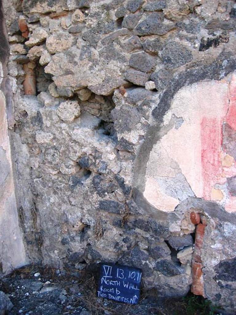 VI.13.10 Pompeii. July 2008. North-west corner of atrium, north wall with two downpipes. Photo courtesy of Barry Hobson.