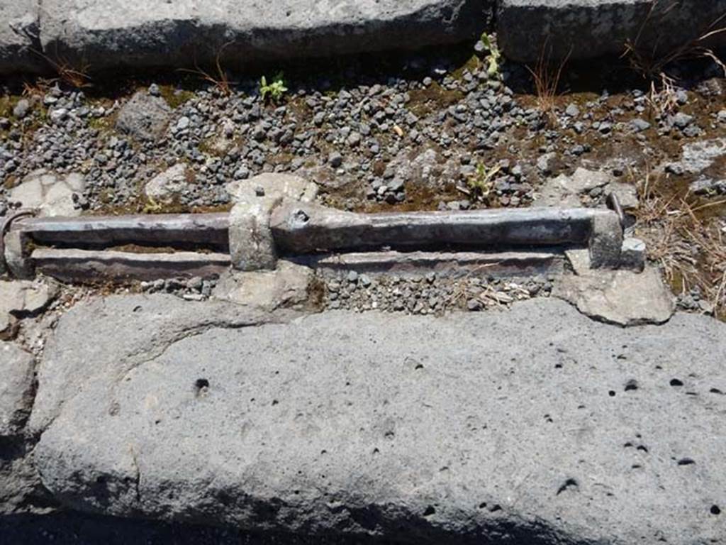 VI.13.14 Pompeii. May 2015. Detail of lead pipes in pavement. Photo courtesy of Buzz Ferebee.
