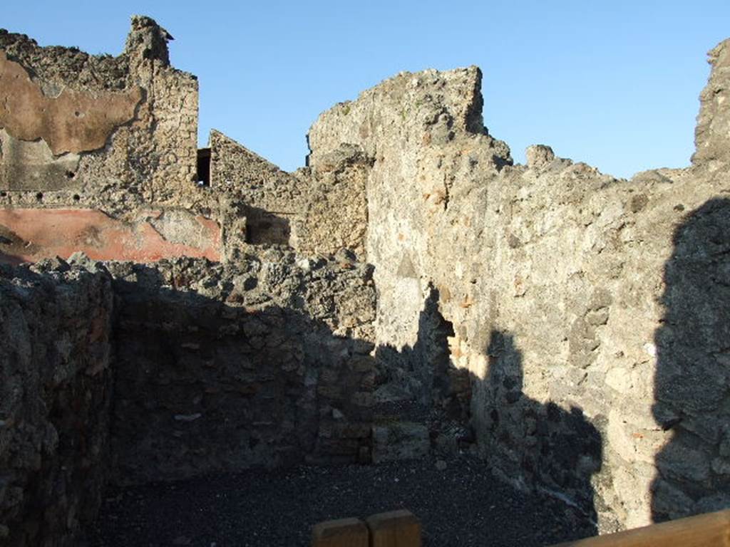 VI.14.9 Pompeii. December 2006. Looking north from entrance, across kitchen and latrine.