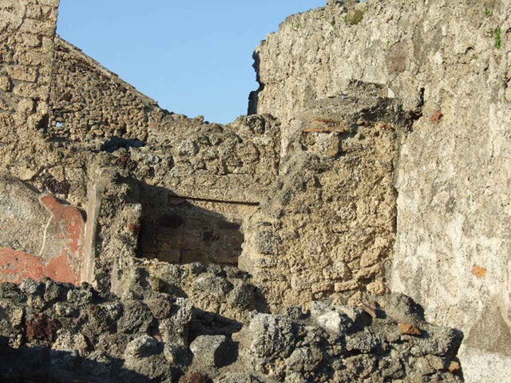 VI.14.9 Pompeii. December 2006. Looking north-east towards small room or cupboard at rear of light-yard.