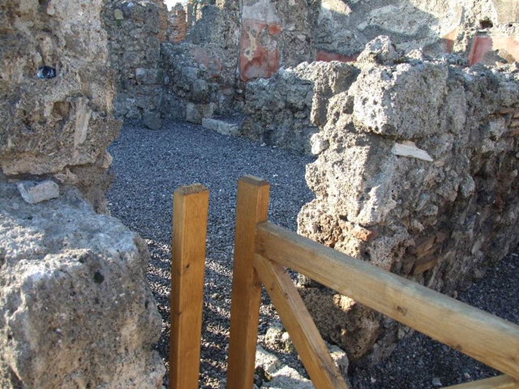 VI.14.9 Pompeii. December 2006. Doorway into VI.14.8, in west wall.