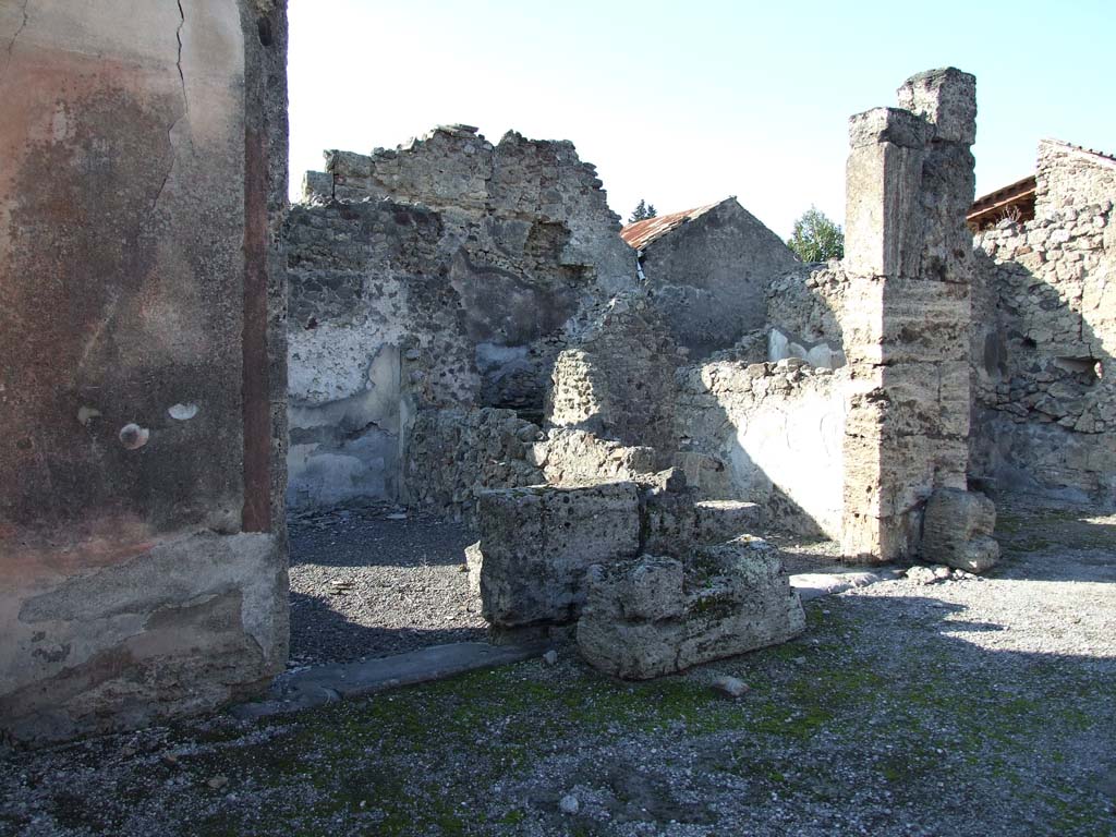 VI.14.12 Pompeii. December 2007. West side of atrium, looking into oecus from entrance doorway.