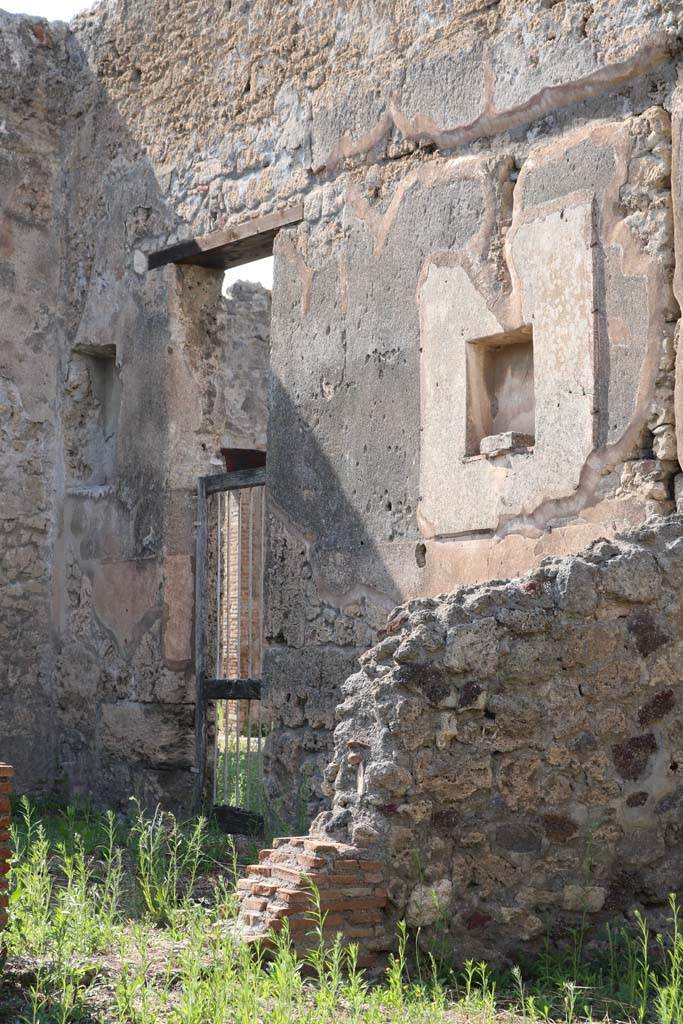 VI.14.19 Pompeii. December 2018. 
Looking north-west towards doorway in VI.14.18, leading into atrium of VI.14.20.
Photo courtesy of Aude Durand.
