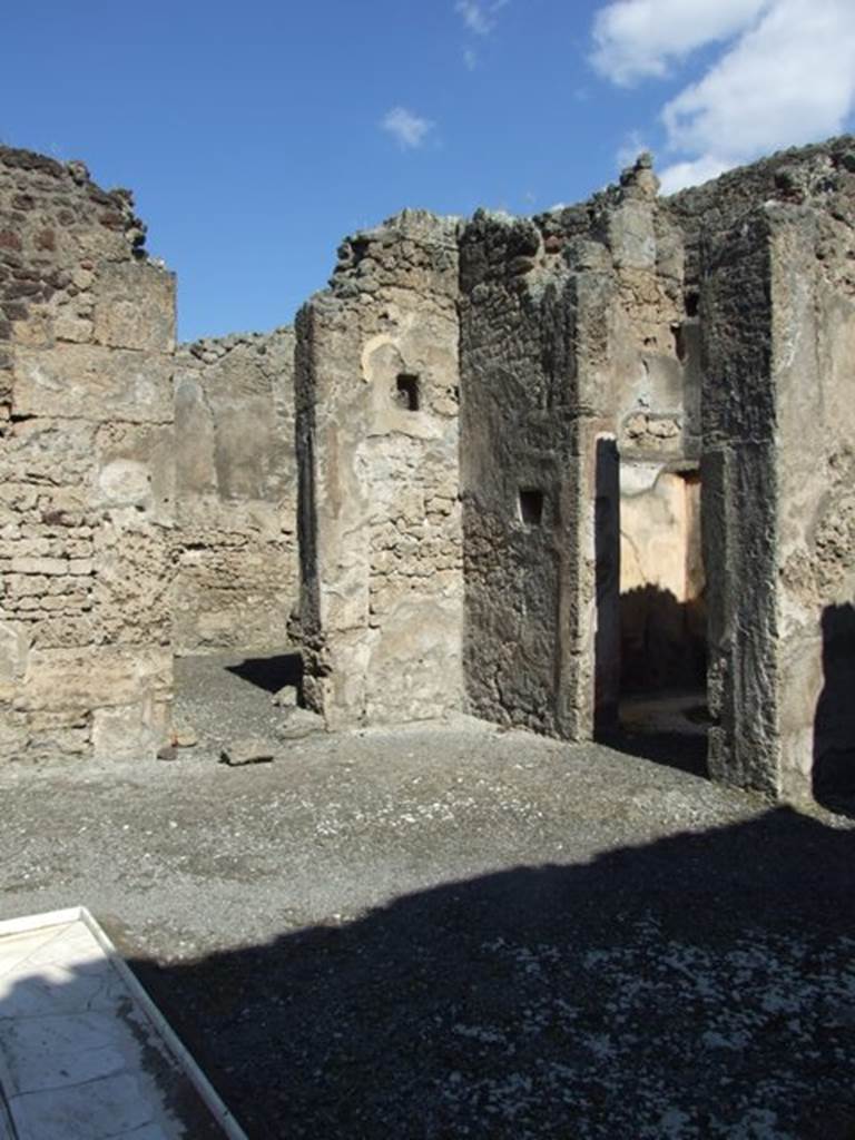 VI.14.20 Pompeii. March 2009. Room 1, north-east corner of atrium, with doorways to room 8 and 9.