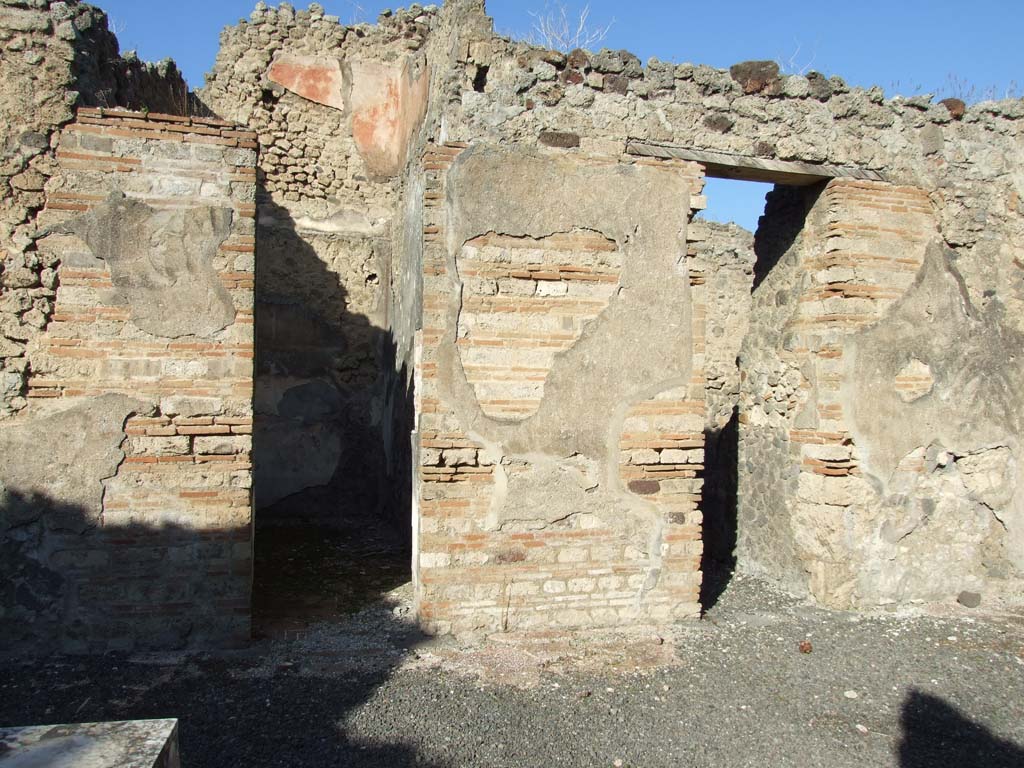 VI.14.22 Pompeii. December 2007. Looking north across atrium to doorways of rooms 8 and 9.