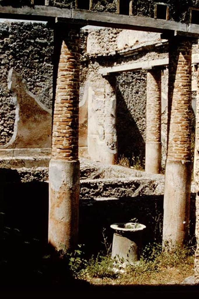 VI.14.22 Pompeii. 1959. Room 12, looking north-west from rear of tablinum, (original peristyle), across rinsing basins. The puteal for the cistern opening can be seen on the eastern side of the vats/basins. Photo by Stanley A. Jashemski.
Source: The Wilhelmina and Stanley A. Jashemski archive in the University of Maryland Library, Special Collections (See collection page) and made available under the Creative Commons Attribution-Non Commercial License v.4. See Licence and use details.
J59f0422
