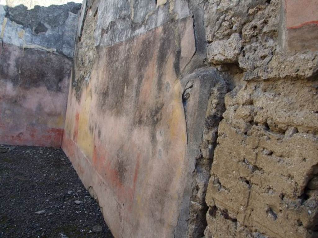 VI.14.22 Pompeii. December 2007. Room 15, south wall of triclinium. According to BdI, on this wall (the right wall) the following paintings were seen upon excavation:
In the middle of the right wall:(1.12 high  x 1.12 wide) but very faded: Judgement of Paris.
On the same wall to the right: medallion (0.33 diam), preserved better than the others showing a crowned Bacchante, with blond hair.
To the right of the medallion: Flying cupid, carrying an object in his hand but this was not clear.
On the upper part of the wall was the usual fantastique architectural decoration with the following figures  Right wall, from the east end: Flying female figure, Neptune bearded and naked, Victoria with palm. See BdI, 1876, (p.24-28)
