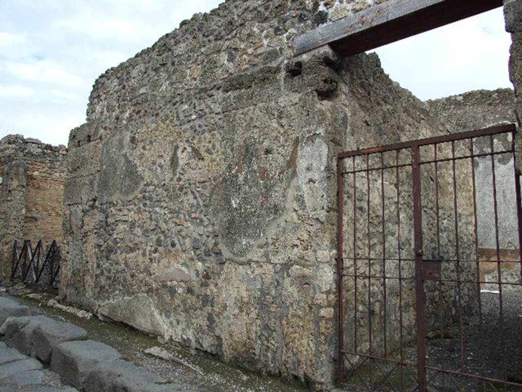 VI.14.37 Pompeii. December 2007. Wall to the left of entrance.