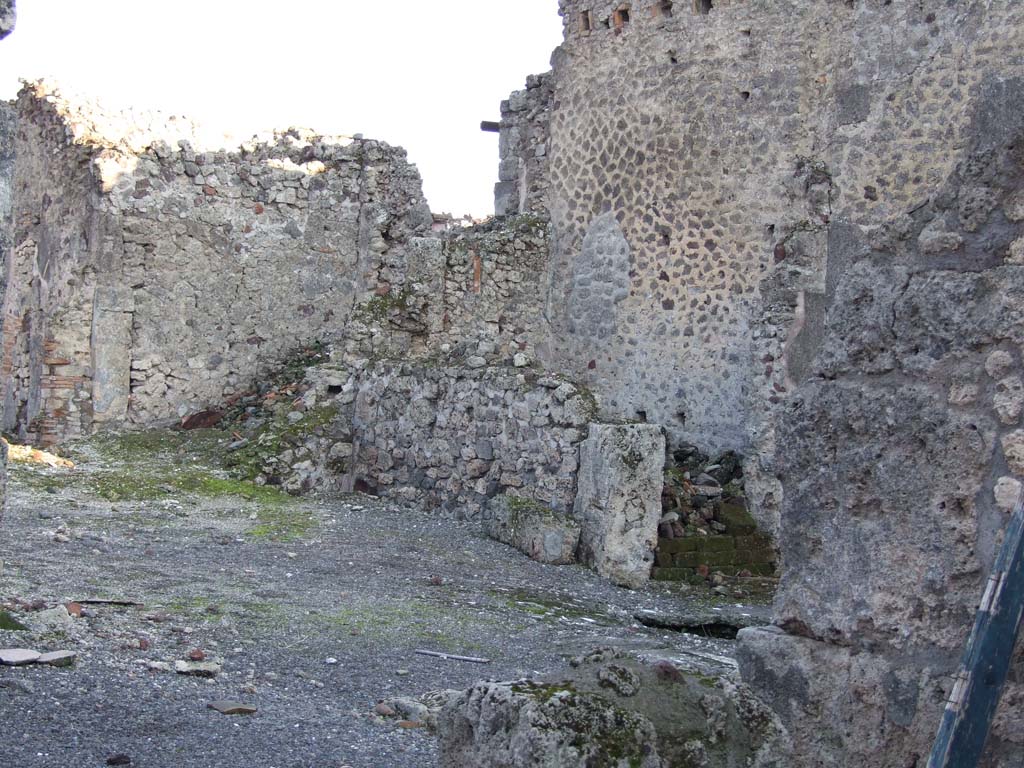 VI.14.38 Pompeii. December 2007. Looking south-east across to atrium of VI.14.39, Casa Lucrum Gaudium, also bombed in 1943.