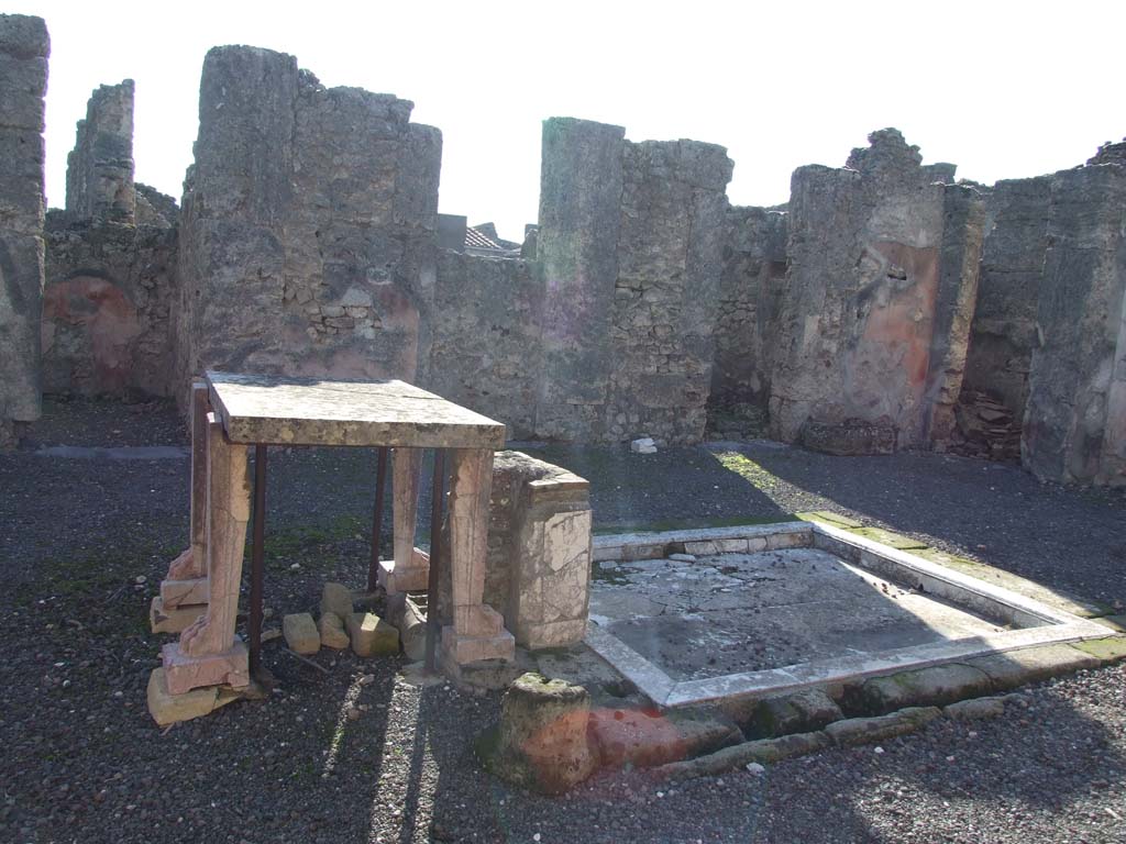 VI.14.43 Pompeii. December 2007. Room 1, looking south-west across impluvium in atrium.