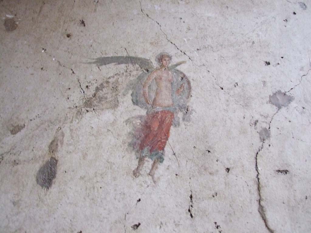 VI.15.1 Pompeii. December 2006. Detail of painted figure in bedroom to the south of atrium.