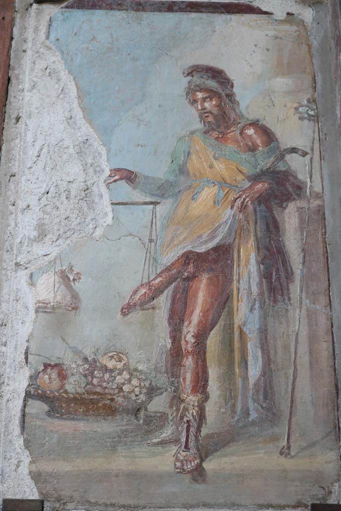 VI.15.1 Pompeii. December 2018. 
Painting of a bearded Priapus from vestibule. Photo courtesy of Aude Durand.
