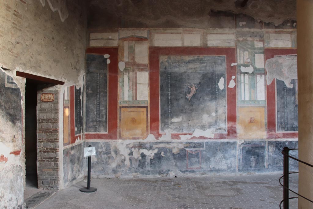 VI.15.1 Pompeii. October 2023. 
Looking south towards south-east corner and doorway to room “o”, on left. Photo courtesy of Klaus Heese.
