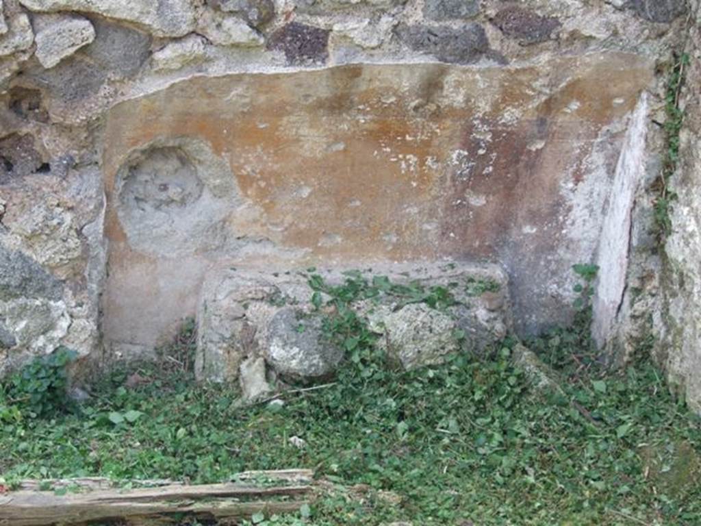 VI.15.5 Pompeii. March 2009. Room 27, bed recess with masonry support for the bed at west end of south wall.  