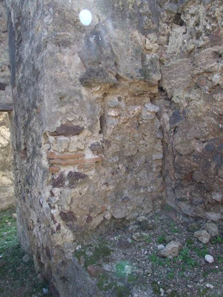 VI.15.5 Pompeii.  March 2009.  Room 2.  South end of bench.

