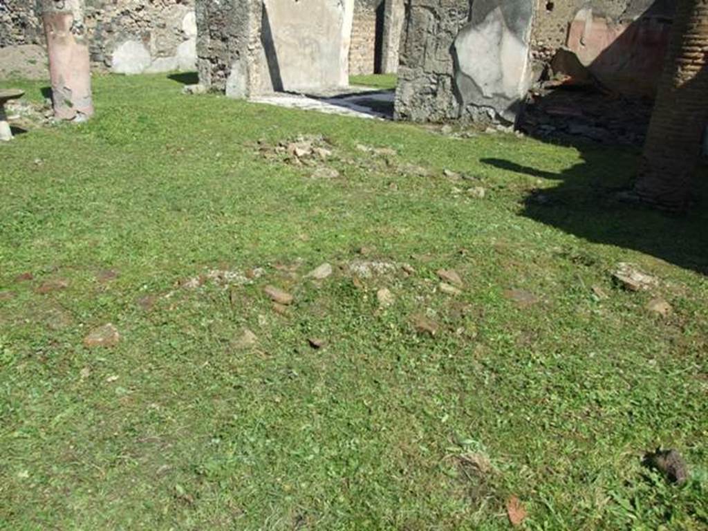 VI.15.5 Pompeii. March 2009. Garden area 11. Looking north-east across the garden to the tablinum and east portico.
According to Jashemski –
In the middle of the garden, the excavators found three slender octagonal columns, and the remnants of a fourth one, finished with green stucco, all that remained of the pergola that had once shaded the triclinium. During the renovation of the house the triclinium had been destroyed save for a part of the west couch which served as a support for an aedicula, still without stucco, built against the west wall apparently to serve as a fountain.
In front of the aedicula niche, on the same base, was a circular masonry monopodium covered with stucco.
Inside the niche was a white marble puteal, covered with a grey marble plate on which stood a marble fountain statuette of a standing nymph.
See Jashemski, W. F., 1993. The Gardens of Pompeii, Volume II: Appendices. New York: Caratzas. (p.156).
According to Soprano –
Ubicazione: peristilio.
Bibliog. Sogliano, Gli scavi di Pompei dal 1873 al 1900, In “Atti del Congr. Internaz. dii Scienze Storiche”, V. 1904, p.334.
L’esistenza di un triclinio nell’area del peristilio era affermata dal Sogliano con la seguente notizia –
“Il peristilio, in origine, conteneva un triclinio di fabbrica protetto da un pergolato che era sostenuto da piccole colonne ottagonali.
Posteriormente, nella rinnovazione della casa, il triclinio fu demolito e non ne fu risparmiata che una parte del lato ovest; la quale parte servi di sodo per poggiarvi le pareti di una nicchia a volta con frontoncino.......”
See Soprano, P. (1950). I triclini all’aperto di Pompei. (In Pompeiana, raccolta di studi per il secondo centenario degli scavi di Pompei. Napoli, Gaetano Macchiaroli, Editore, p.309, no.39.
portico.