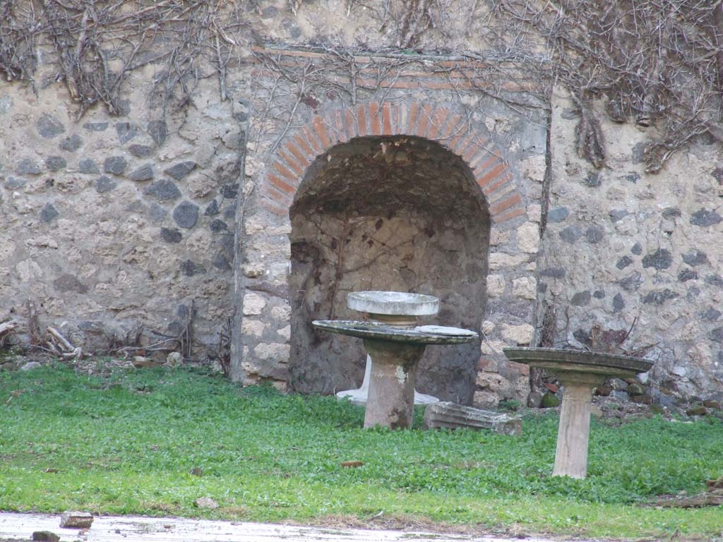 VI.15.5 Pompeii. December 2007. Looking west at tables in garden area.  