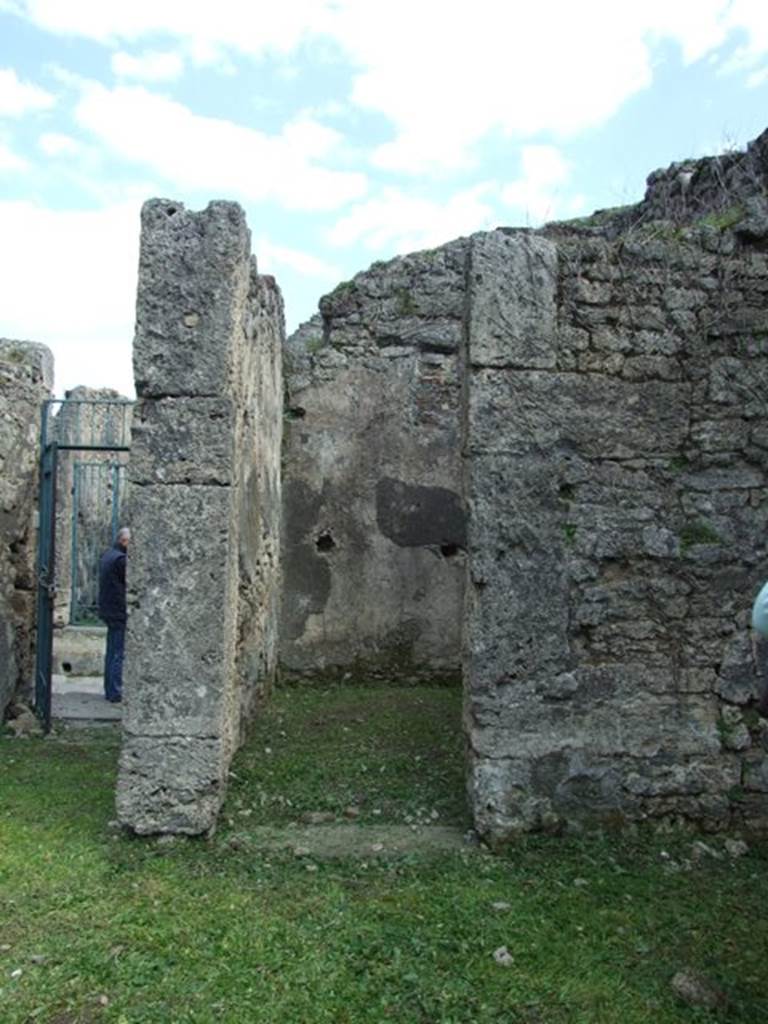 VI.15.6 Pompeii. March 2009. Doorway to room 3, cubiculum, on south side of entrance corridor. According to NdS, this room was quite rustic and could have been used as a storeroom
