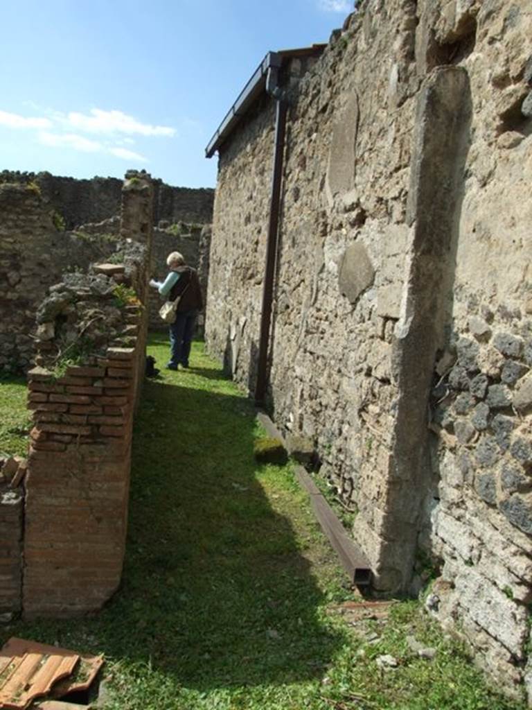 VI.15.6 Pompeii. March 2009.  Room 6.  Corridor leading west to rear rooms.